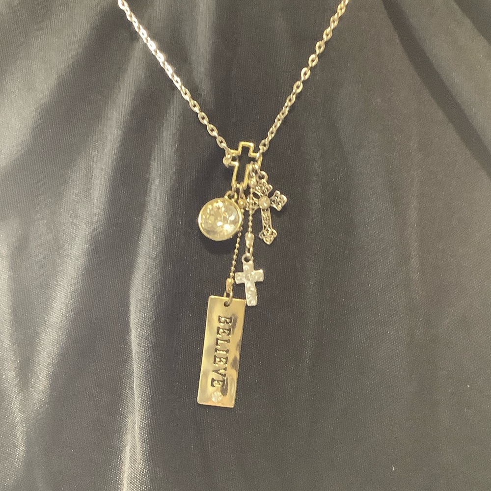 Gold tone Charm Necklace with Crosses and Believe Pendant